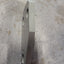 100-001-146P LATCH PLATE, EJECTOR DOOR, RH MDX 270, 300; PAINTED